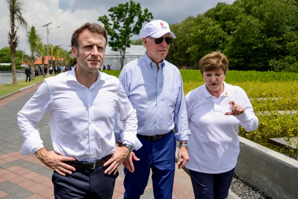 With U.S. President Joe Biden and France’s President Emmanuel Macron at the G20 Summit in Bali, November 2022.